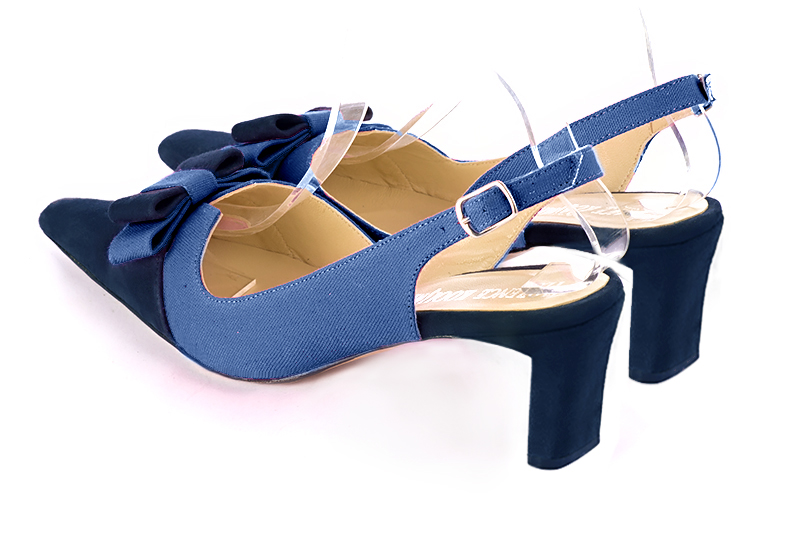 Navy blue women's open back shoes, with a knot. Tapered toe. Medium comma heels. Rear view - Florence KOOIJMAN